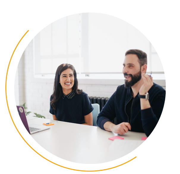 coworkers smiling in an office